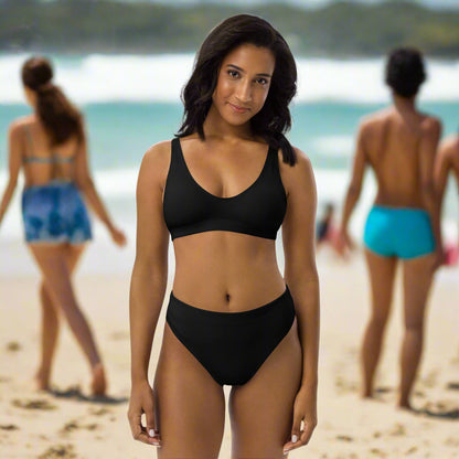 Woman wearing Eco-Essentials High-Waisted Bikini at the beach