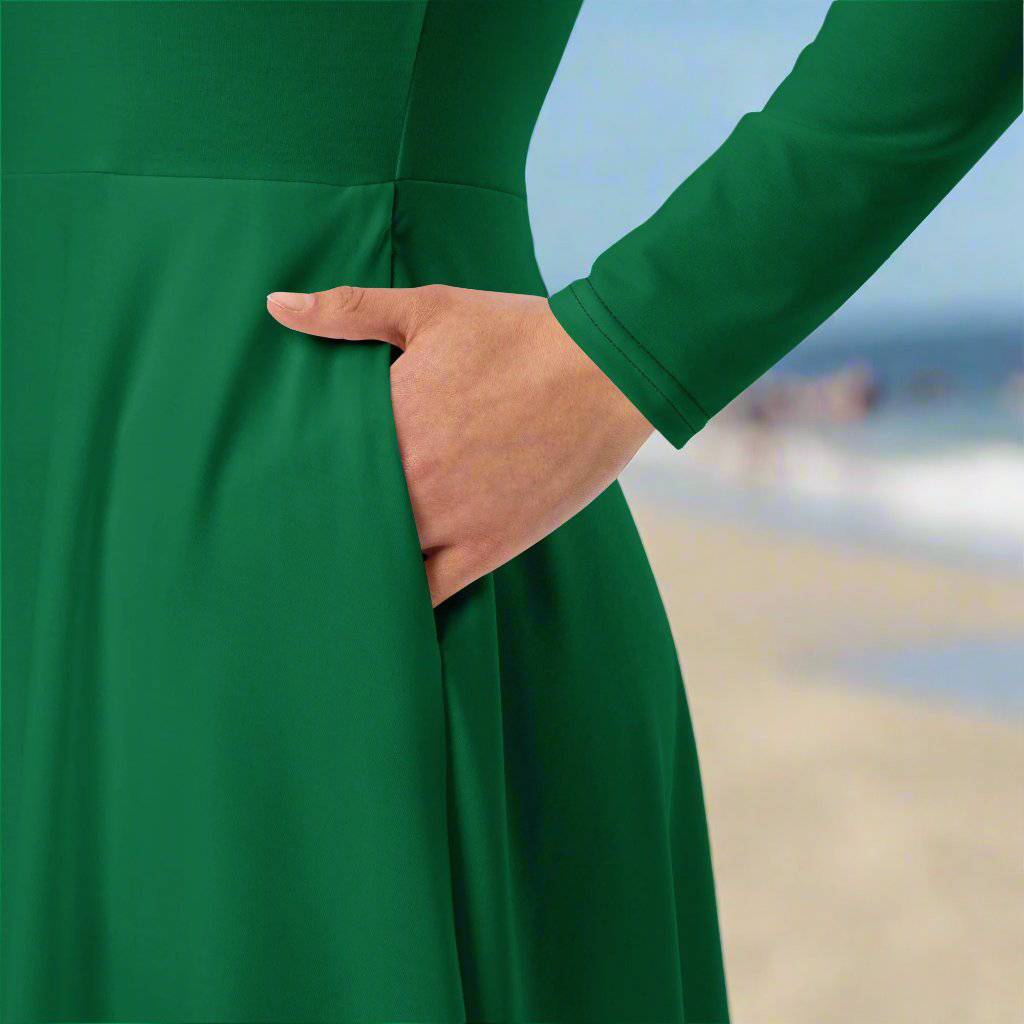 Close-up of side pocket detail on the Evergreen Elegance Midi Dress, showcasing functional style.