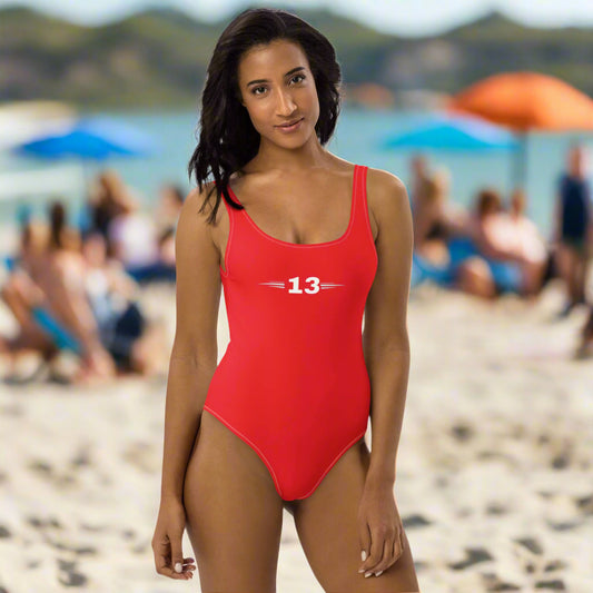 Woman wearing Fearless Flame One-Piece Swimsuit front view at the beach