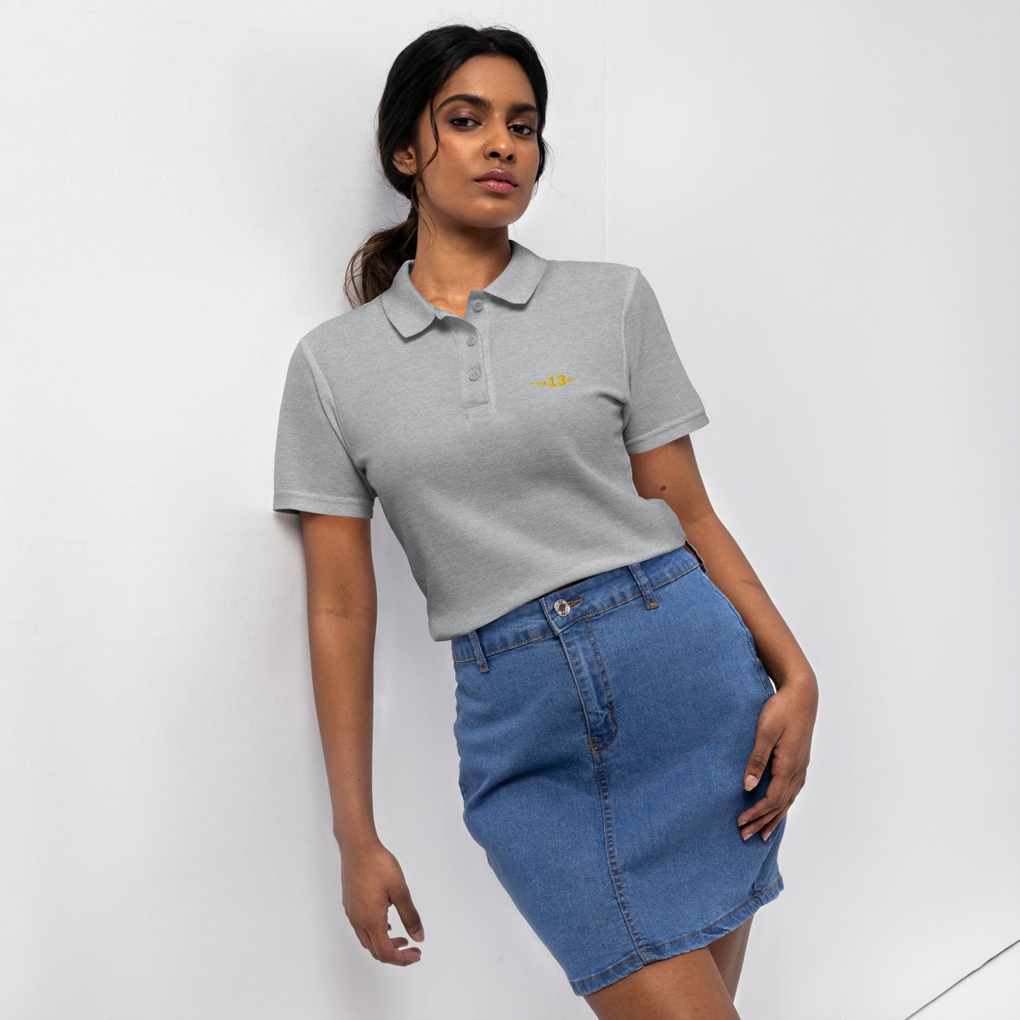 Woman wearing grey Premium Women's Pique Polo Shirt front view