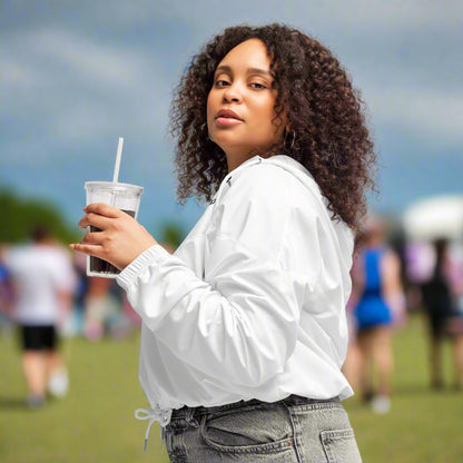 Left side view of a woman wearing Pure Eclipse White Cropped Windbreaker