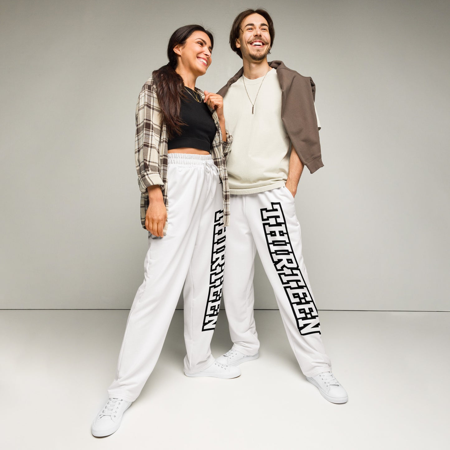 Couple wearing Retro Vibes Unisex Wide-Leg Joggers front view