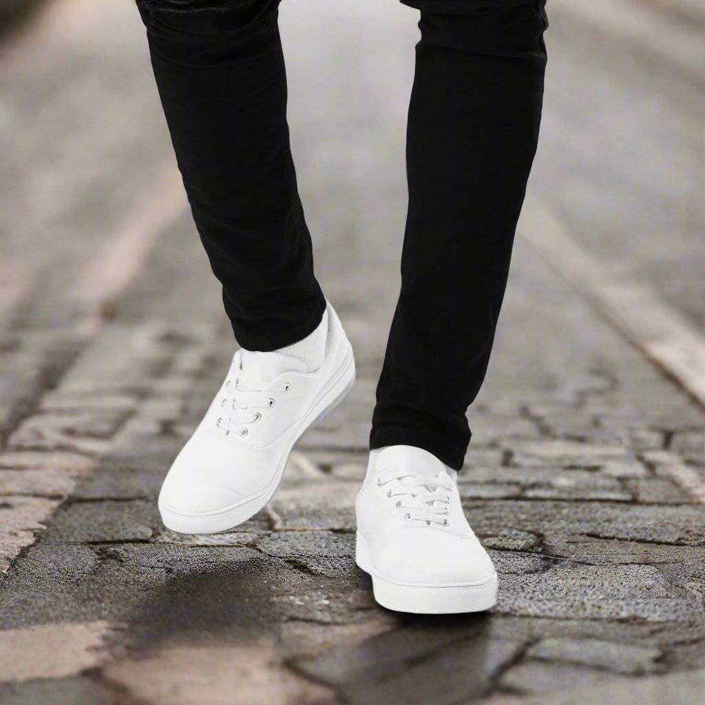 Stride 13 Men's Canvas Shoes with minimalist all-white design, durable canvas upper, and matching soles.