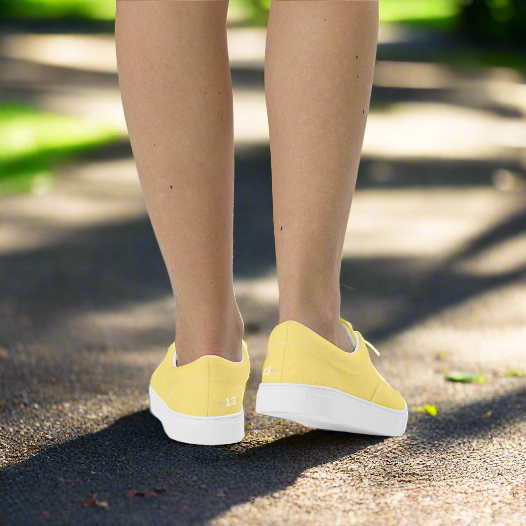 Woman walking in Sunlit Grace Lace-Ups in the park