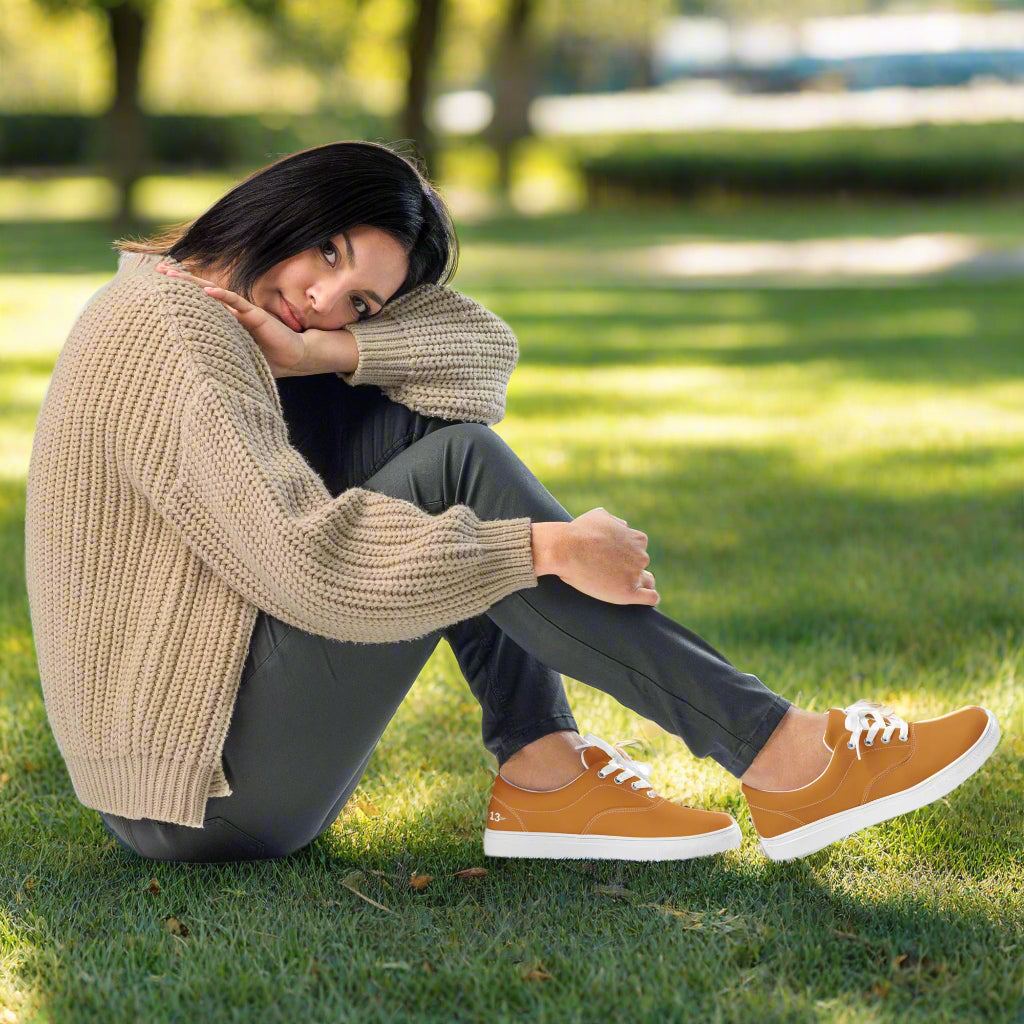 Woman sitting wearing The Empower Lace-Ups