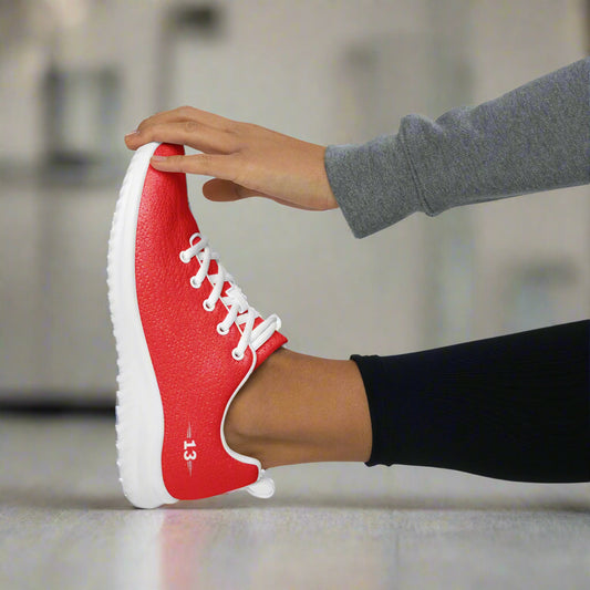 Woman streatching in The Fire Dash Sneakers