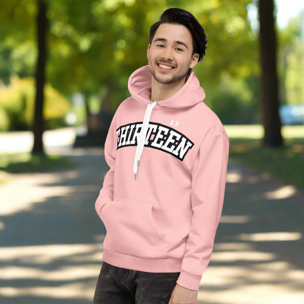 Man wearing Thirteen Cozy Pink Unisex Hoodie front view