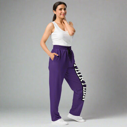 Side view of a woman wearing Thirteen Unisex Purple Wide-Leg Joggers