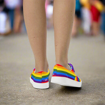 Woman walking in Vivid Pride Lace-Ups at a festival