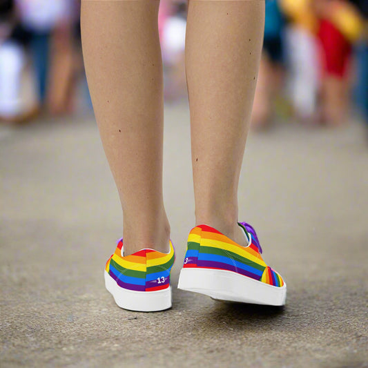 Woman walking in Vivid Pride Lace-Ups at a festival