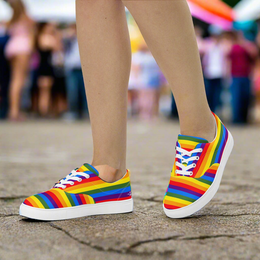 Woman walking in Vivid Pride Lace-Ups at a festival