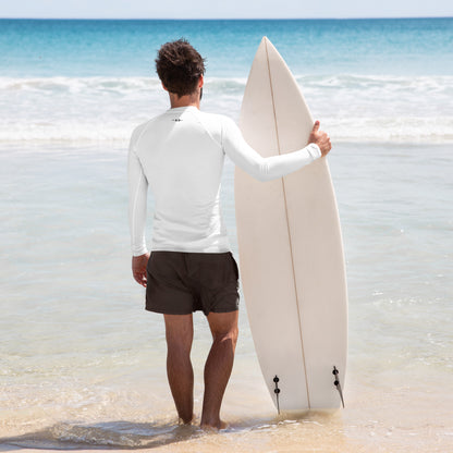 Man in White Rash Guard at the beach