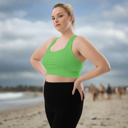 woman wearing Vibrance Longline Sports Bra side view at the beach