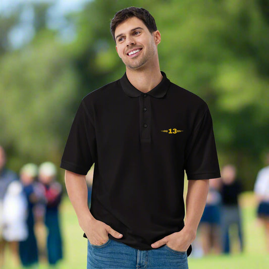 Black Premium Polo Shirt featuring relaxed fit and elegant detailing.