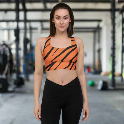 Fierce Roar Longline Sports Bra with bold tiger stripes in vibrant orange and black