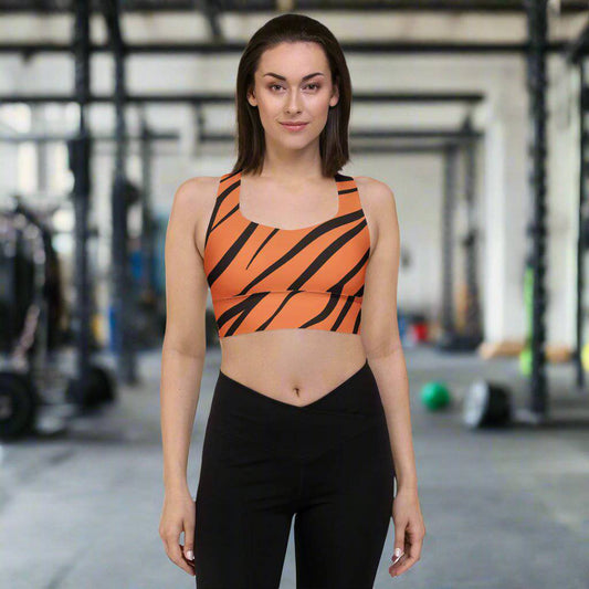 Fierce Roar Longline Sports Bra with bold tiger stripes in vibrant orange and black