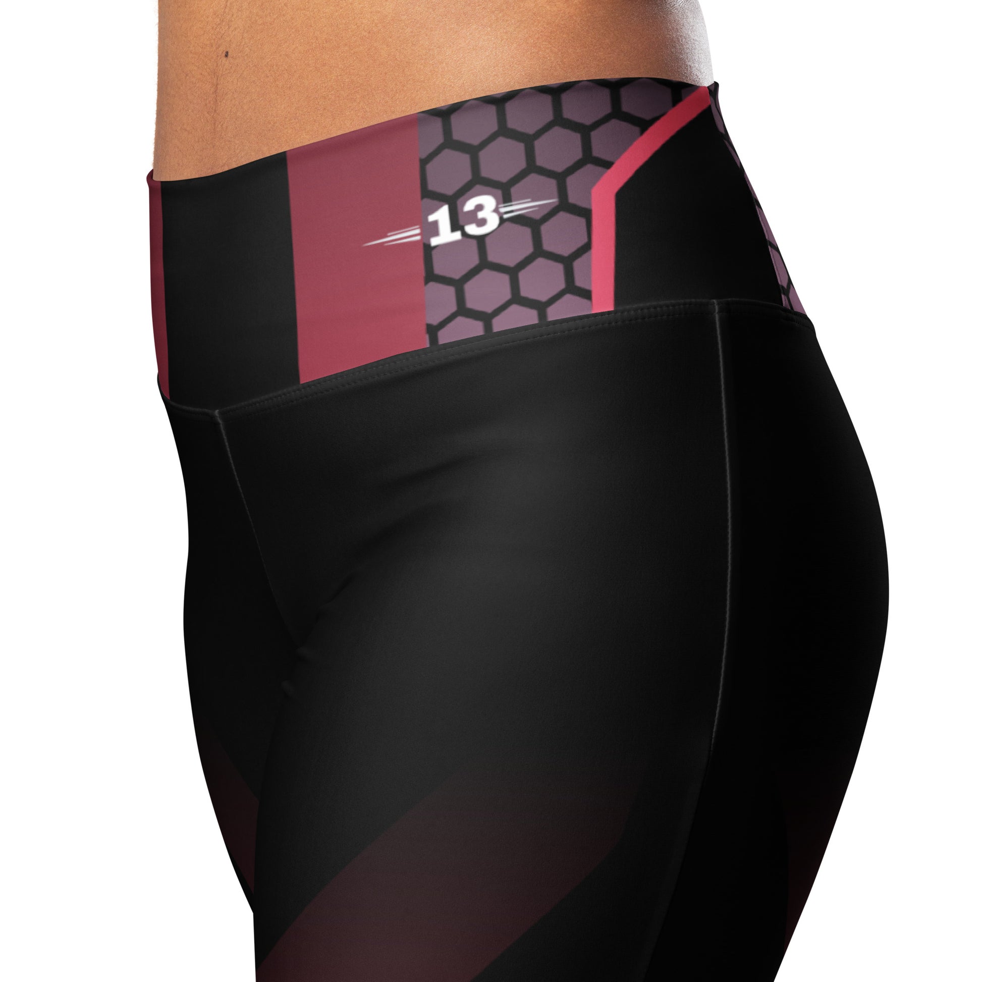 Closeup view of logo on the side of starlight gradient flare leggings