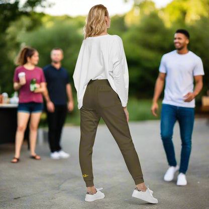 woman in military green Unisex Fleece Sweatpants back view