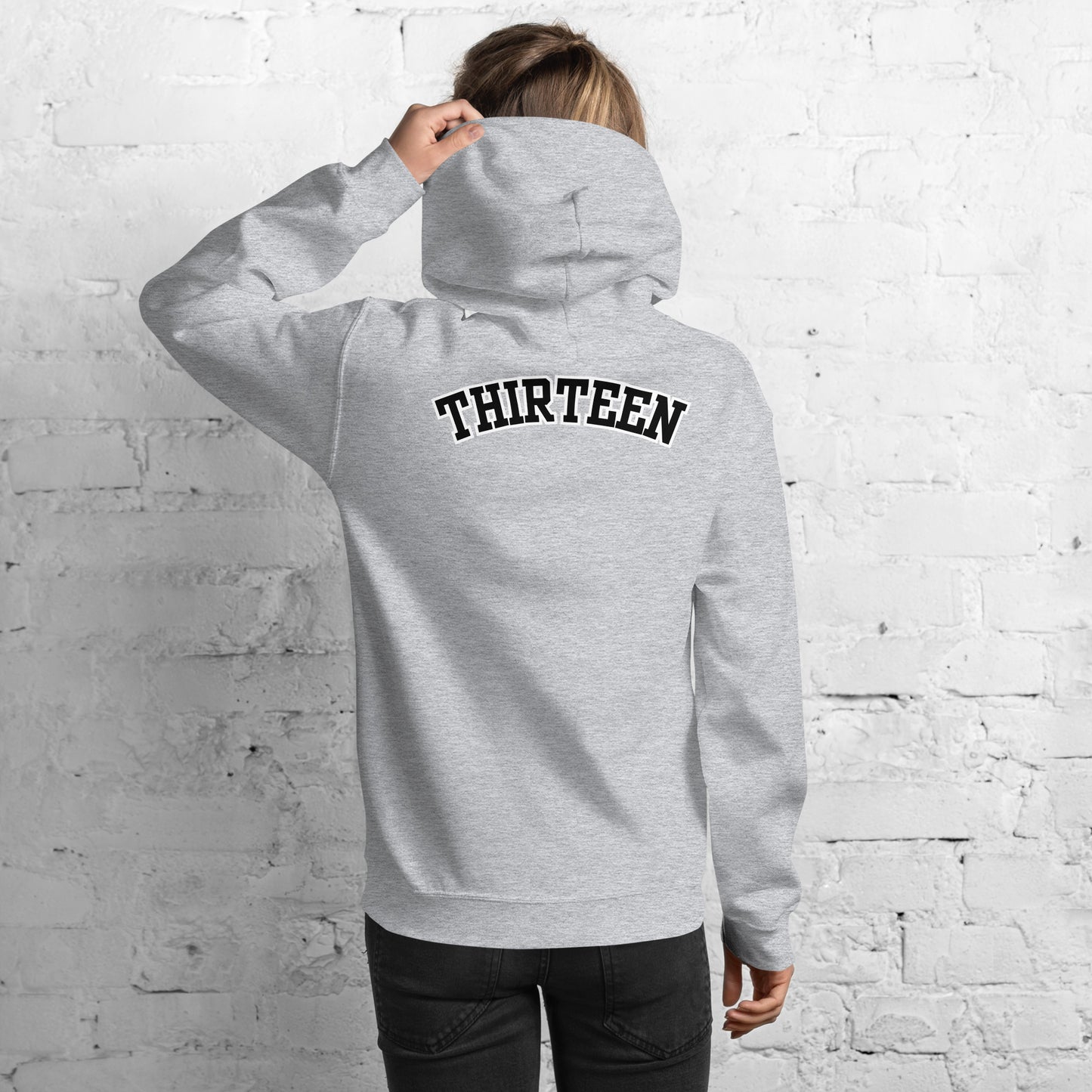 Back view of the Thirteen Classic Unisex Hoodie in sport gray with bold "Thirteen" logo.