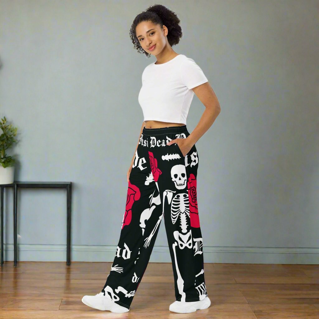 Relaxed fit unisex wide-leg pants with bold skeleton and rose print.